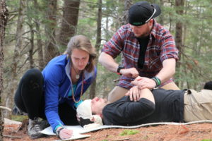 ASF Program Supervisor, Steve Luppino practices wilderness first aid procedures.  