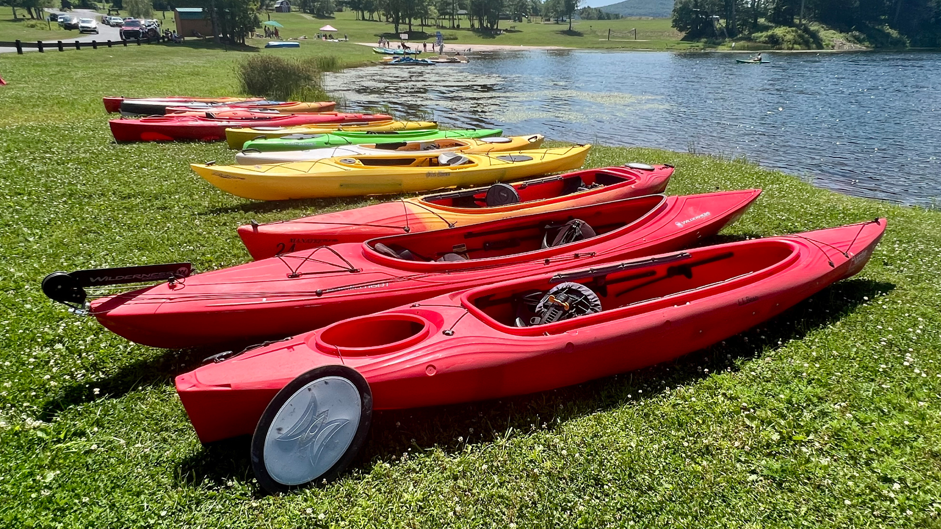 Empty kayaks on a shore