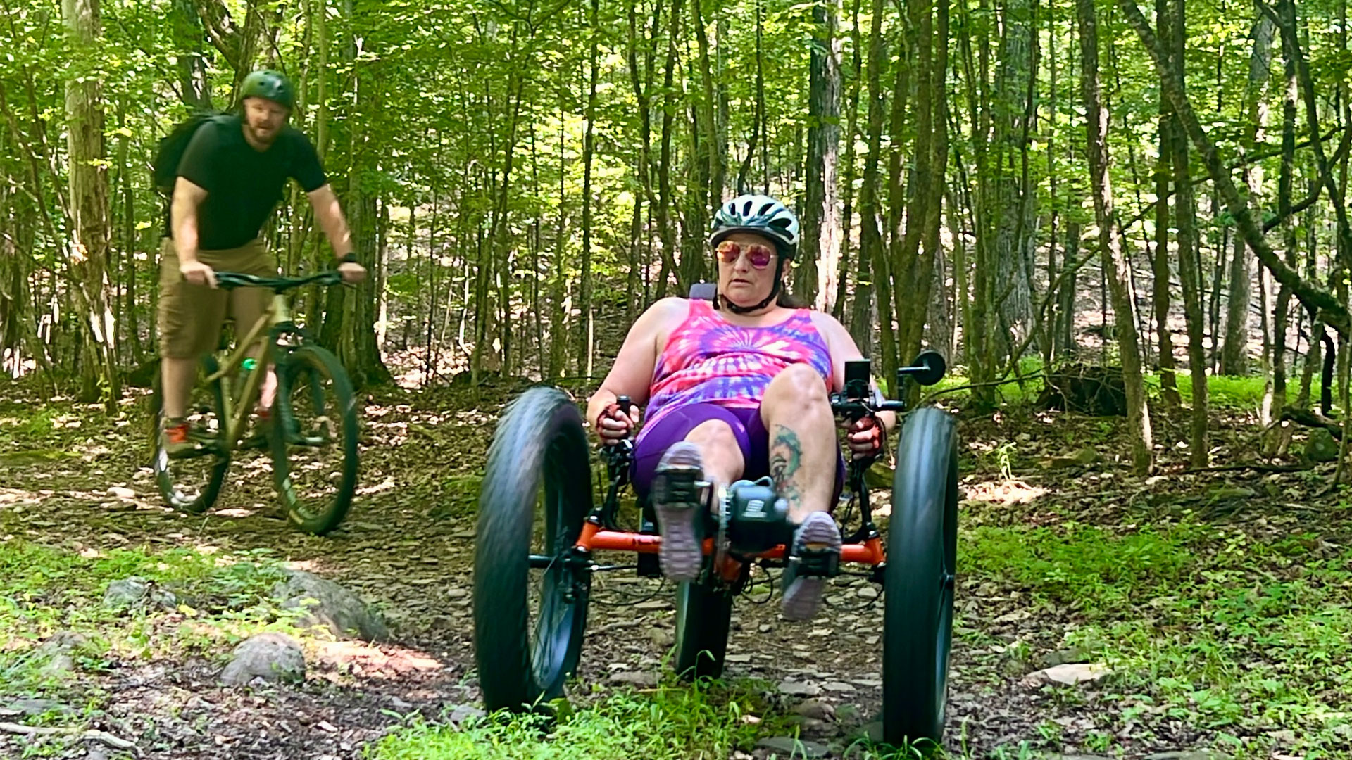 Woman riding recumbent mountain bike